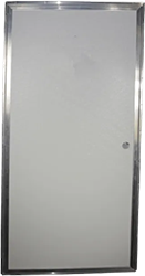 White walk-in door installed on a metal building wall