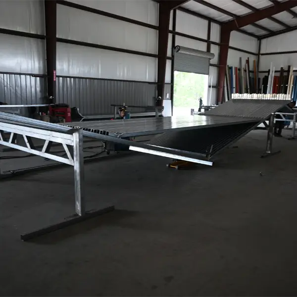 Roof pitch with welded roof supports for a metal building structure.